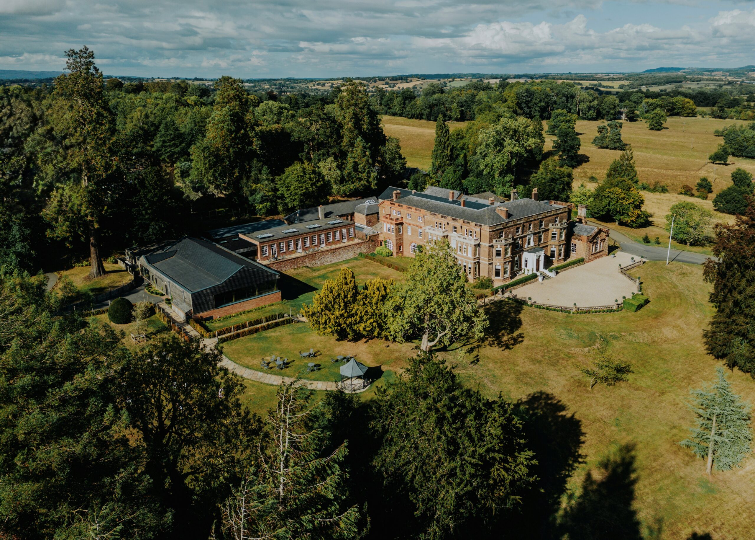 Aerial view of Bredenbury Court Barns wedding venue in Herefordshire countryside near Bromyard