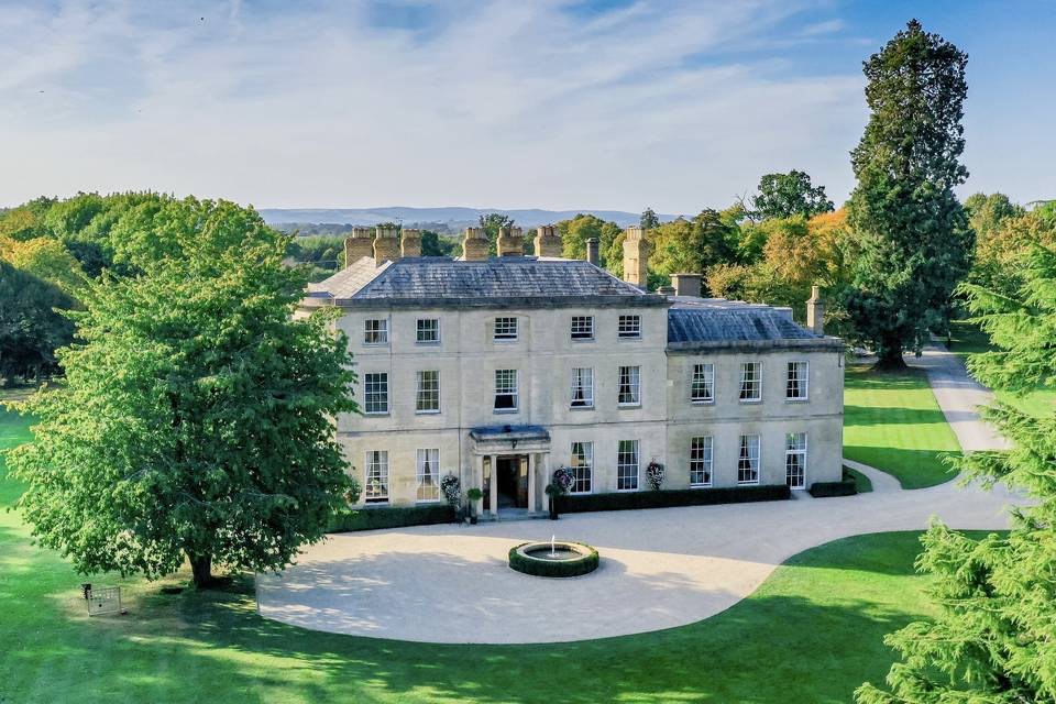 aerial view Eastington Park Georgian manor house wedding venue Gloucestershire countryside